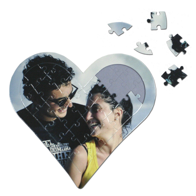 Detalle de Puzzle con tu foto con forma de corazón de 27 piezas